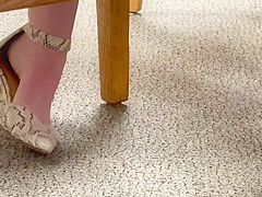 Feet soles arches of unaware worker