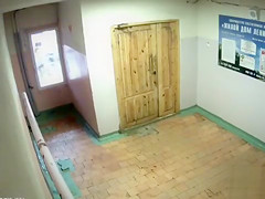 Peeing girls caught on security camera in the lobby