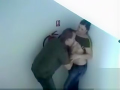 Hidden sex under a stairwell with two horny lovers