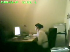 Raunchy security cam masturbation from the office cutie